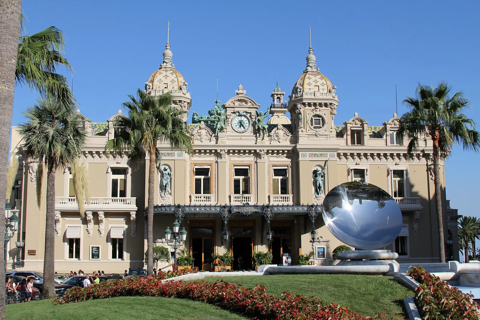 The Casino de Monte-Carlo seen from Place du Casino, its twin towers and ornamented facade above the forecourt