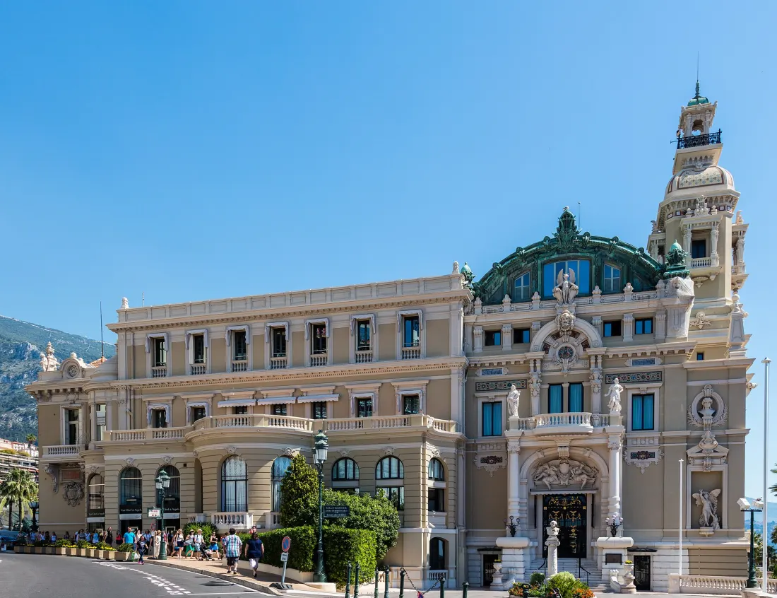 The seaward side of the Casino de Monte-Carlo, with the domed Salle Garnier opera wing at the right and its separate artists' entrance at street level
